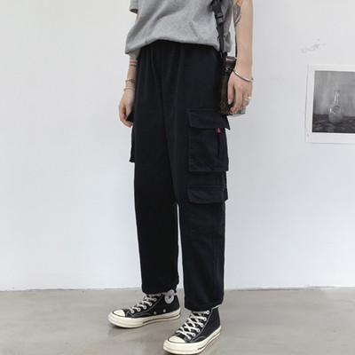 Női nadrág zsebekkel és rugalmas derékkal - széles modell