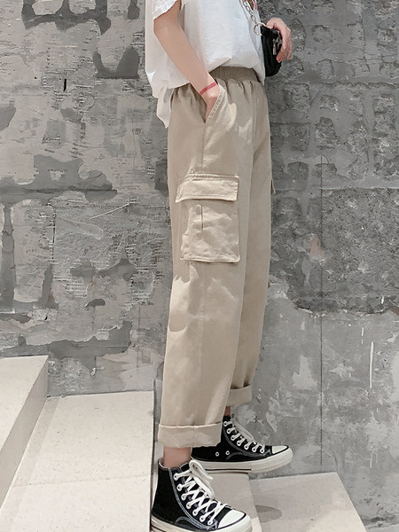 Női nadrág zsebekkel és rugalmas derékkal - széles modell