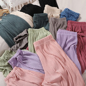 Alkalmi női redős nadrág gumírozással a bokánál