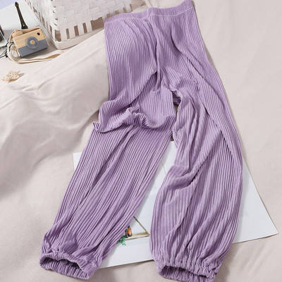 Alkalmi női redős nadrág gumírozással a bokánál