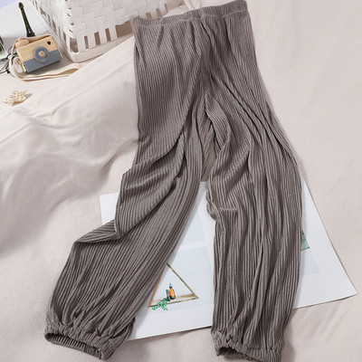 Alkalmi női redős nadrág gumírozással a bokánál