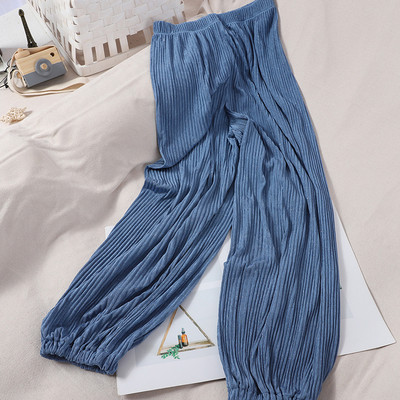 Alkalmi női redős nadrág gumírozással a bokánál