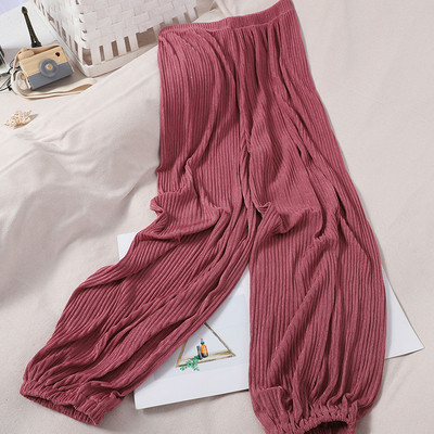 Alkalmi női redős nadrág gumírozással a bokánál