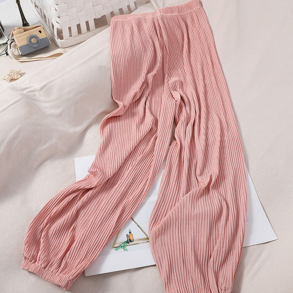 Alkalmi női redős nadrág gumírozással a bokánál