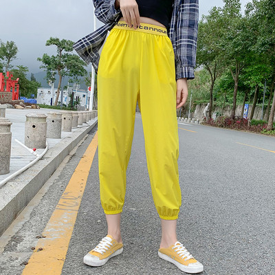 Moodsad naiste püksid elastse vöökoha ja taskutega