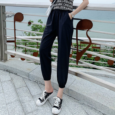 Moodsad naiste püksid elastse vöökoha ja taskutega