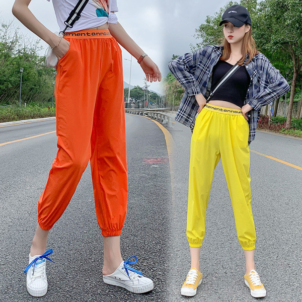 Moodsad naiste püksid elastse vöökoha ja taskutega