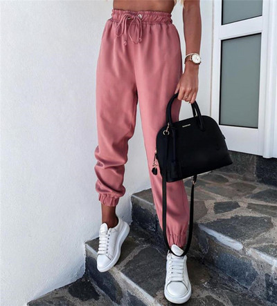 Modern női nadrág elasztikus derékkal és megkötővel