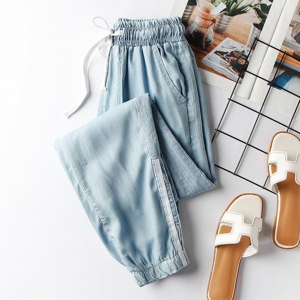 Alkalmi női nadrág szegéllyel és gumírozott derékkal