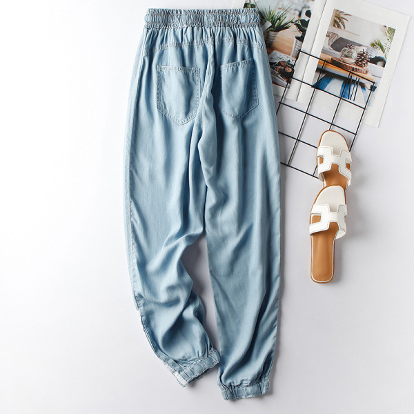 Alkalmi női nadrág szegéllyel és gumírozott derékkal