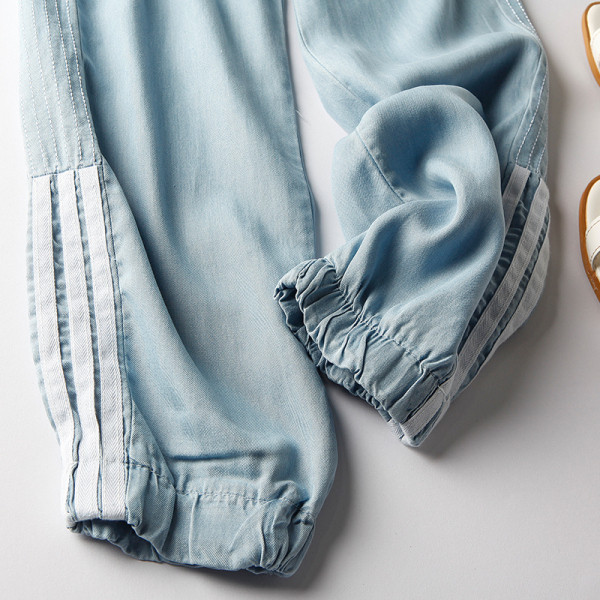 Alkalmi női nadrág szegéllyel és gumírozott derékkal