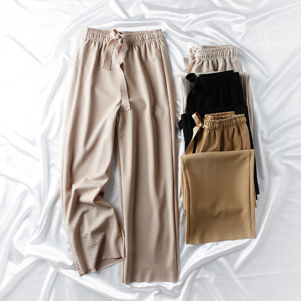 Női hosszú nadrág gumírozott derékkal és szalaggal