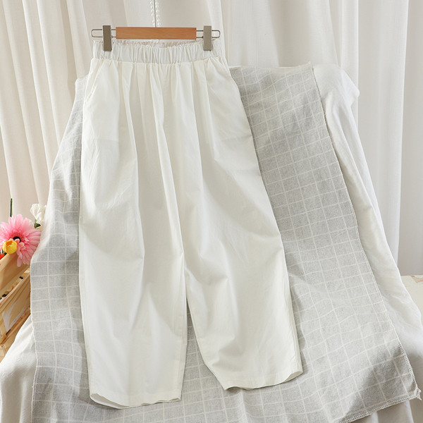 Naiste pikad püksid elastse vöökoha ja taskutega