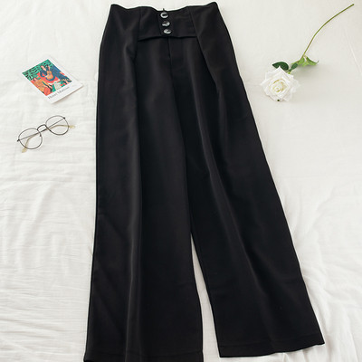 Női nadrág magas derékkal és gombokkal - széles modell