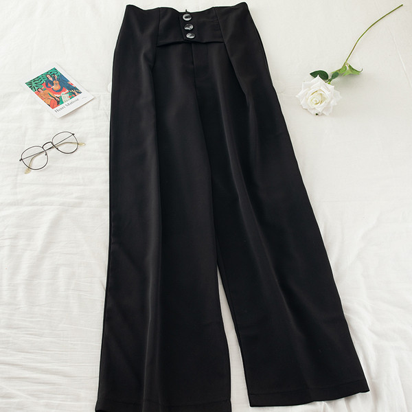 Női nadrág magas derékkal és gombokkal - széles modell