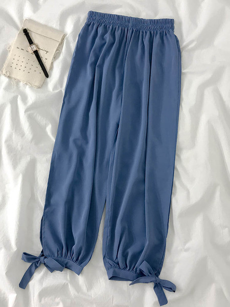 Modern női nadrág elasztikus derékkal és megkötővel