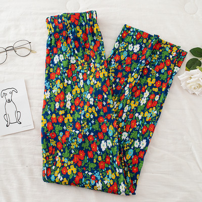 Redős női nadrág virágmintával és gumírozással