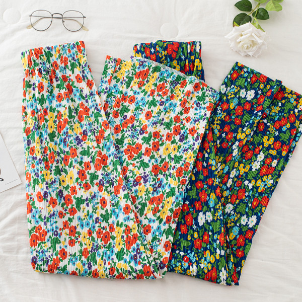 Redős női nadrág virágmintával és gumírozással