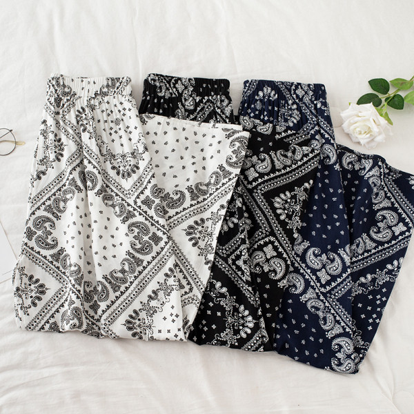 Alkalmi női nadrág magas derékkal - széles modell