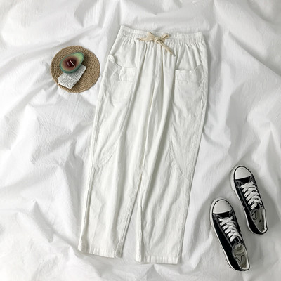 Sieviešu bikses ar elastīgu jostasvietu un kabatām divās krāsās