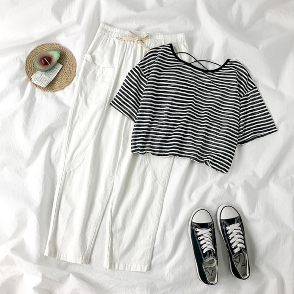 Sieviešu bikses ar elastīgu jostasvietu un kabatām divās krāsās