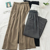 Modern női nadrág övvel - széles modell