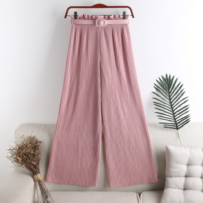 Hajtogatott női nadrág övvel és magas derékkal