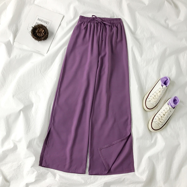 Női alkalmi nadrág nyakkendővel és gumis derékkal