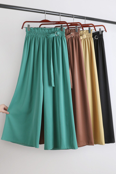 Széles női nadrág gumival és övvel