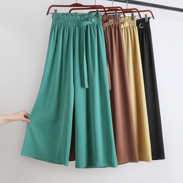 Széles női nadrág gumival és övvel