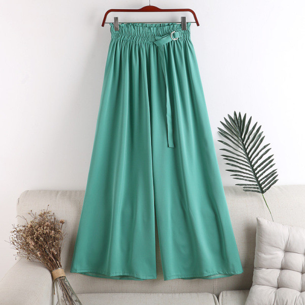 Széles női nadrág gumival és övvel