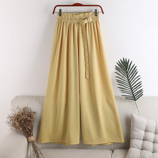 Széles női nadrág gumival és övvel