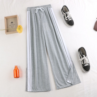 Alkalmi női nadrág szegéllyel, magas derékkal