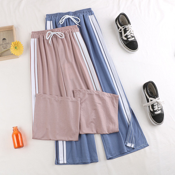 Alkalmi női nadrág szegéllyel, magas derékkal