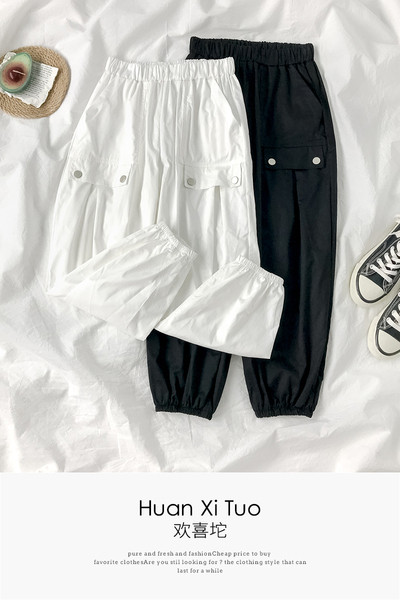 Naiste elastse vöökoha ja taskutega püksid