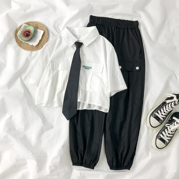 Naiste elastse vöökoha ja taskutega püksid