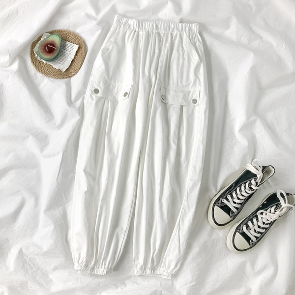 Naiste elastse vöökoha ja taskutega püksid