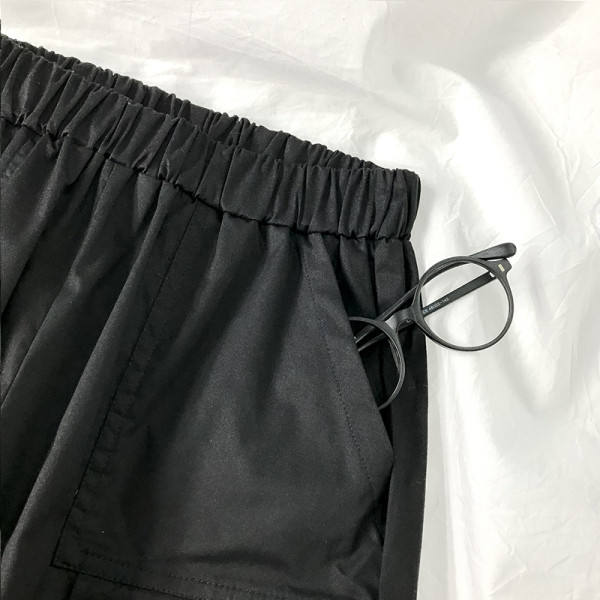 Naiste elastse vöökoha ja taskutega püksid