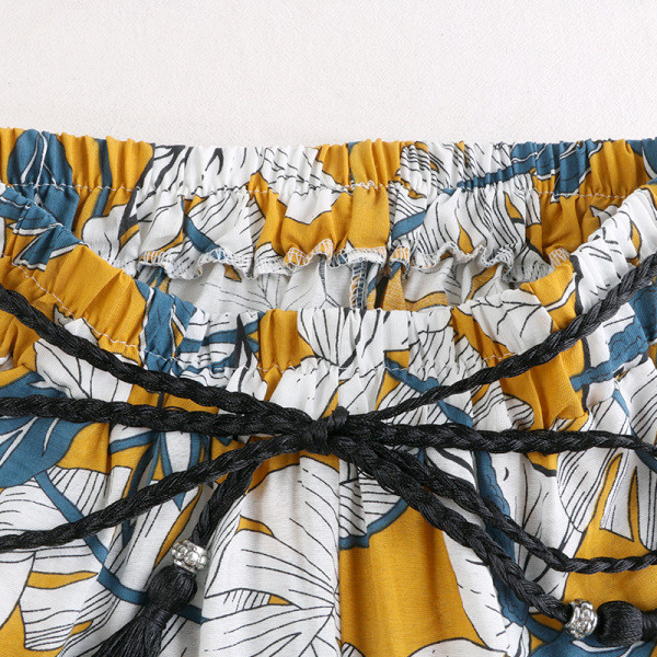 Ikdienas sieviešu bikses ar ziedu rakstu un saitēm