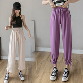 Női nadrág elasztikus derékkal és megkötővel