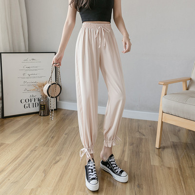 Női nadrág elasztikus derékkal és megkötővel