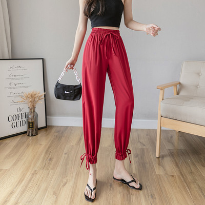 Női nadrág elasztikus derékkal és megkötővel