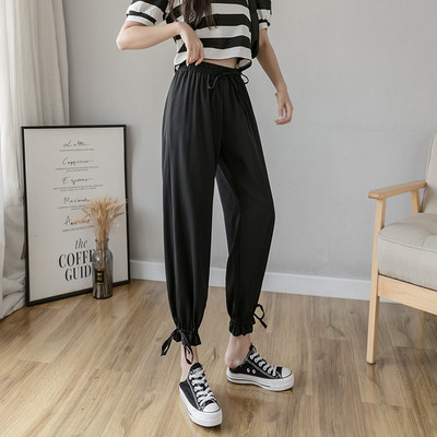 Női nadrág elasztikus derékkal és megkötővel