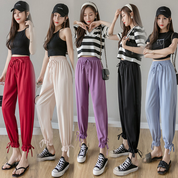 Női nadrág elasztikus derékkal és megkötővel