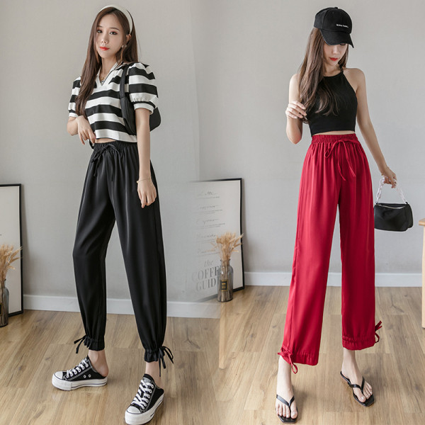 Női nadrág elasztikus derékkal és megkötővel