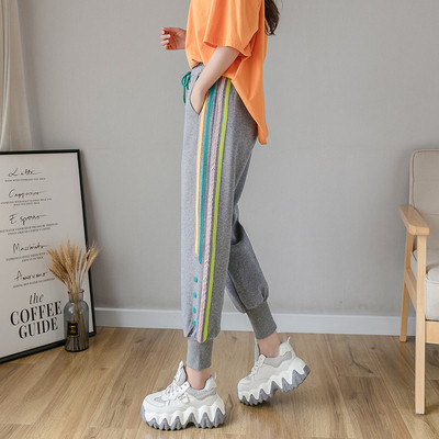 Alkalmi női sportnadrág szegéllyel