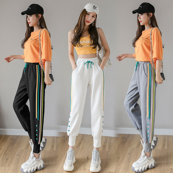 Alkalmi női sportnadrág szegéllyel