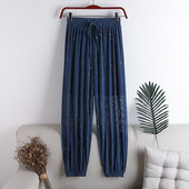 Sieviešu bikses ar spīdīgām daļiņām un saitēm