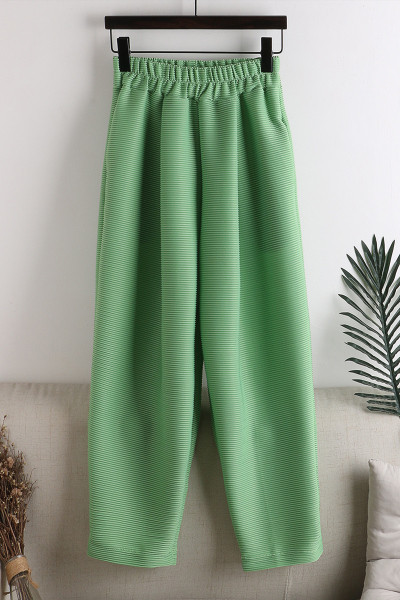 Alkalmi női nadrág gumival és zsebekkel