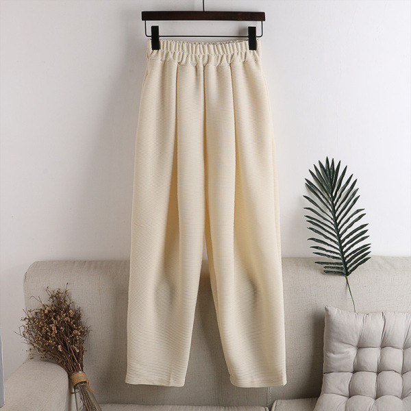 Alkalmi női nadrág gumival és zsebekkel